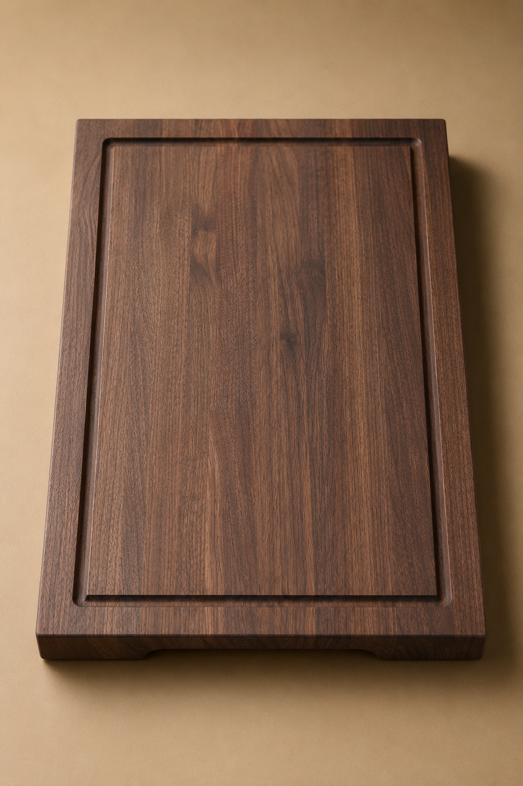 The Prestige walnut edge grain cutting board on warm neutral background by Board and Grain