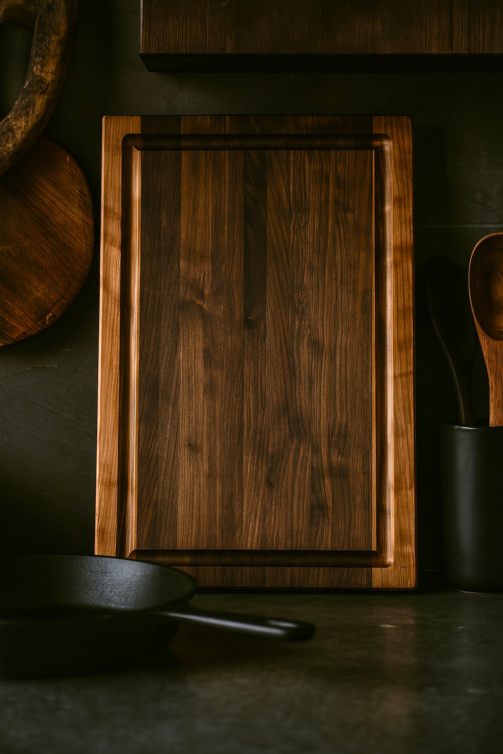 Straight-on top view of The Harvest walnut and cherry cutting board emphasizing grain pattern.
