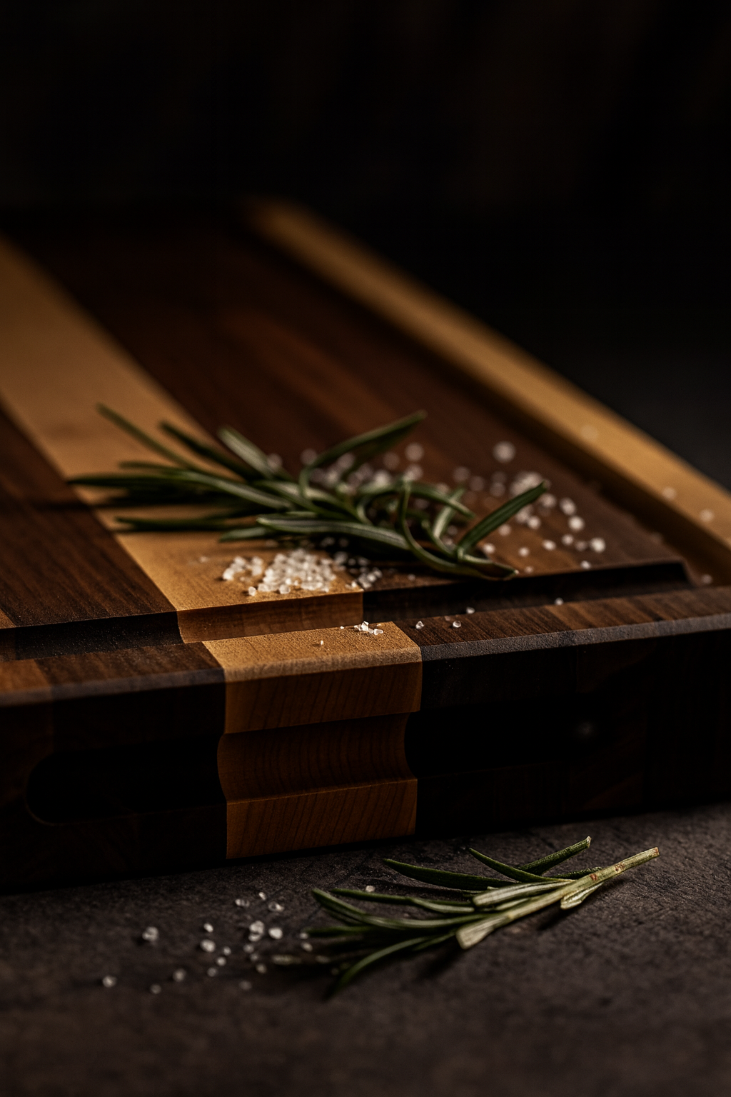 Close-up detail of The Ridge board’s walnut and maple contrast and juice groove craftsmanship.

