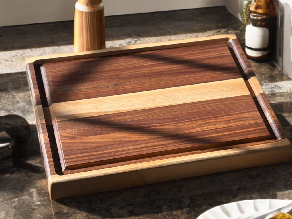 Diagonal view of The Ridge walnut and maple cutting board with juice groove