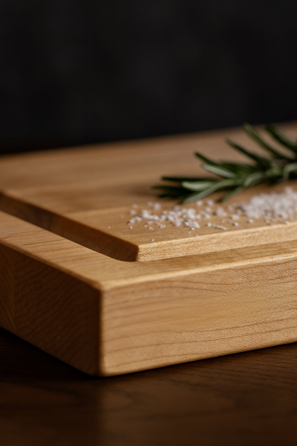 Corner detail of The Wynn maple cutting board highlighting clean edges and premium woodworking.